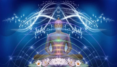 Person sitting peacefully by the ocean, symbolizing emotional waves and inner healing during a spiritual journey